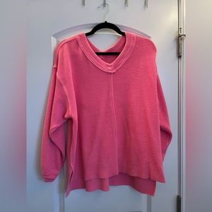 Aerie, size XS, long sleeve pink sweater. V-neck.
